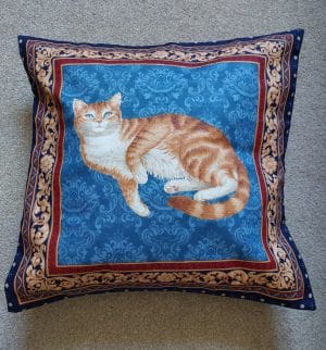 Handmade cushion cover featuring a Ginger Cat